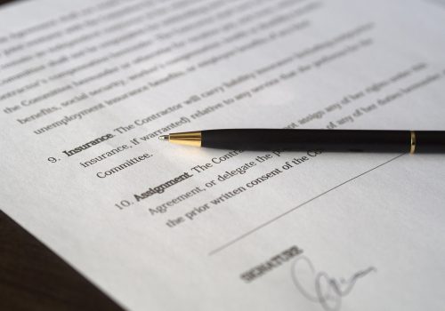 a pen and a sheet of paper