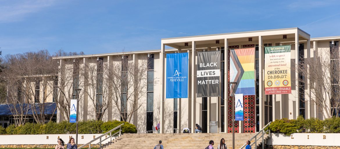 students walking in front of ramsey library